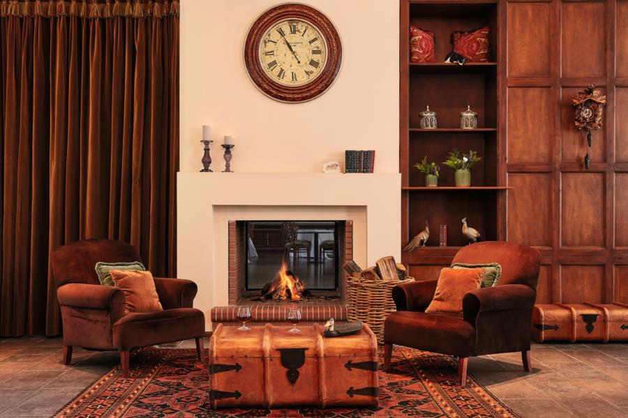 Grecotel Astir Palace Alexandroupoli Exterior photo A living room with a fireplace